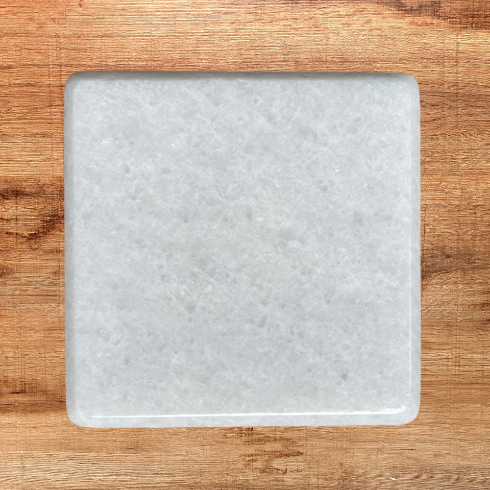 Tabla de mármol blanco cuadrada de 15 x 15 cm, ideal para servir alimentos o como pieza decorativa.